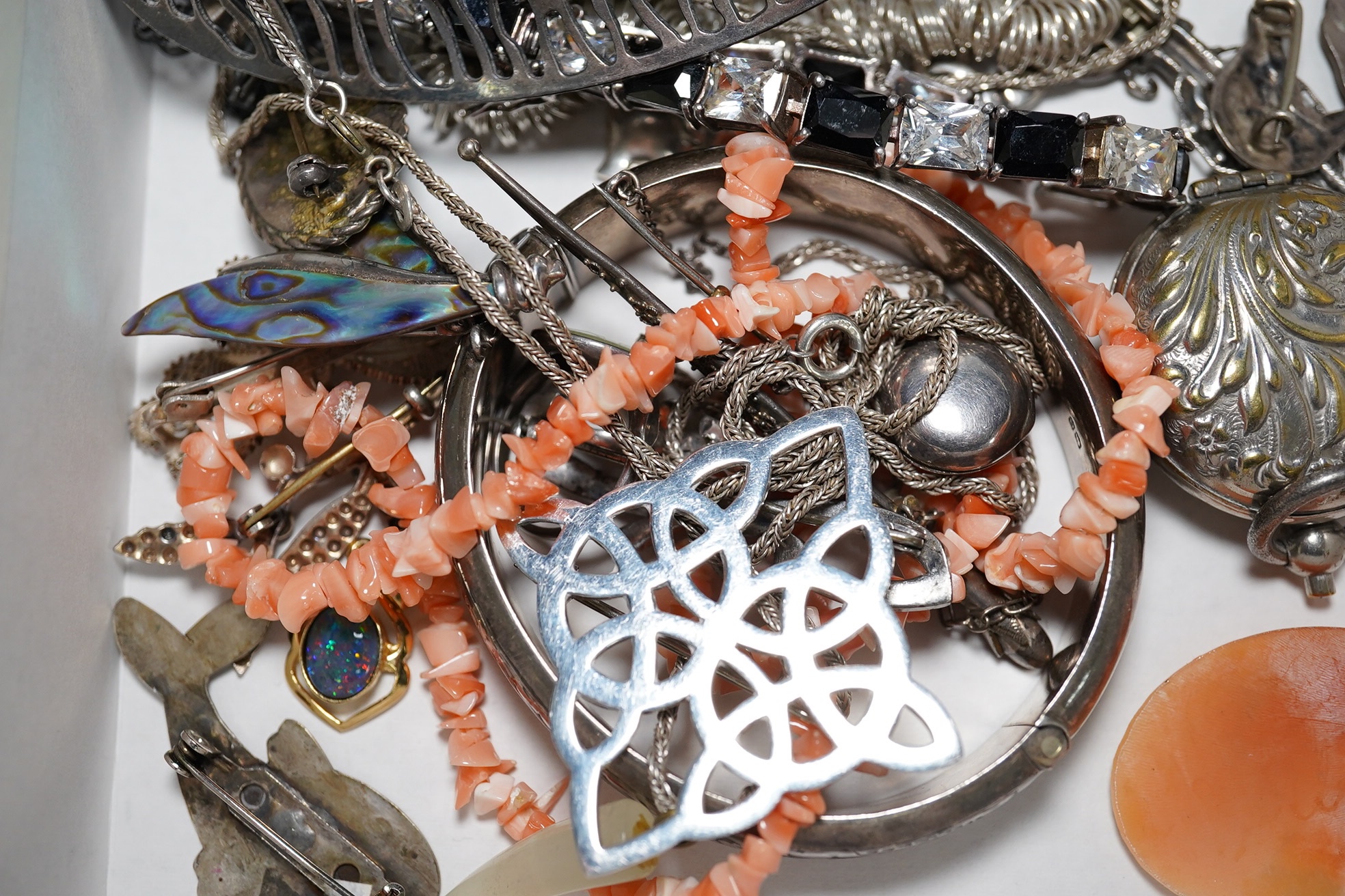 Assorted silver and jewellery including hinged bangle, pendants, brooches etc. Condition - poor to fair
